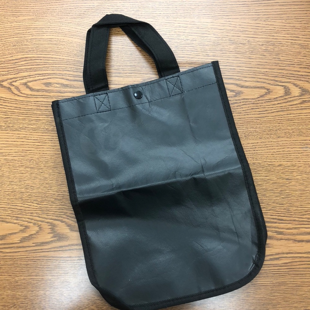 Black lululemon small bag with writing